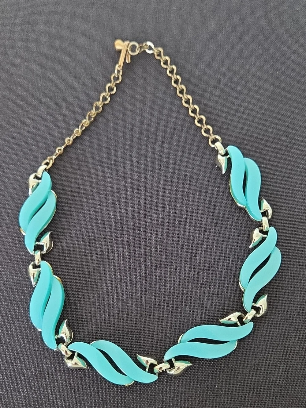 Vintage Coro turquoise enamel and gold-tone wave link necklace from the 1950s